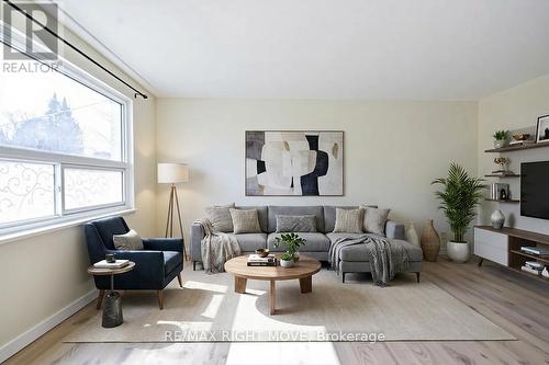 Photo is Digtially Staged. - 162 Pratt Crescent, Gravenhurst, ON - Indoor Photo Showing Living Room