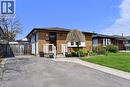 Brick and siding exterior featuring a covered front entry with white railings - 181 Lawnhurst Drive, Hamilton, ON  - Outdoor With Facade 