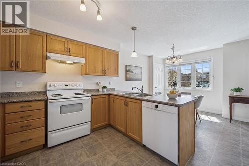 50 Howe Drive Unit# 16B, Kitchener, ON - Indoor Photo Showing Kitchen With Double Sink