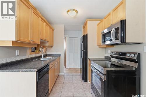 2022 Easthill, Saskatoon, SK - Indoor Photo Showing Kitchen With Double Sink