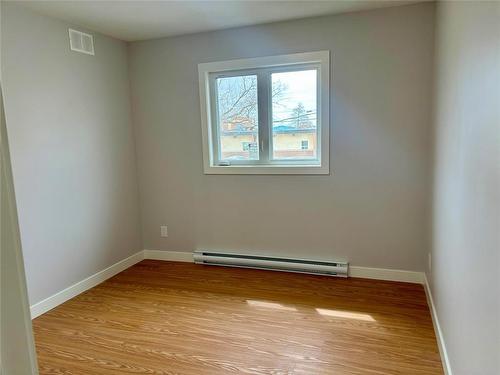 Main floor bedroom - 1536 9Th Street, Brandon, MB - Indoor Photo Showing Other Room