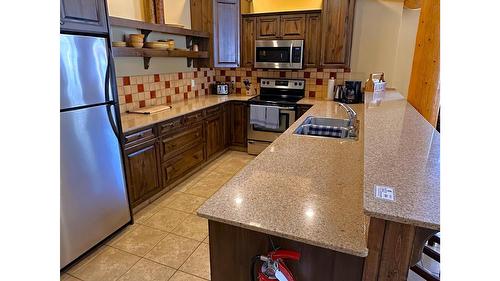 M4-D-1351 Gerry Sorensen Way, Kimberley, BC - Indoor Photo Showing Kitchen With Double Sink