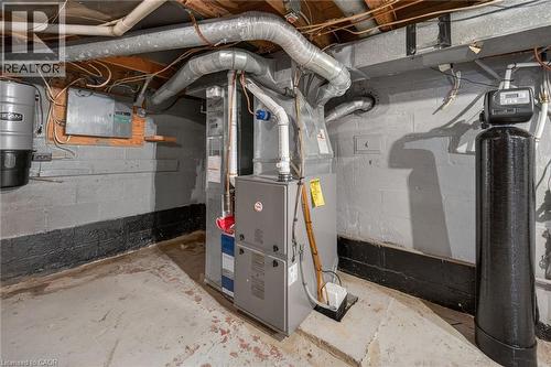 Mechanical room featuring a furnace, water softener, and central vacuum system - 192 Ivon Avenue, Hamilton, ON - Indoor Photo Showing Basement