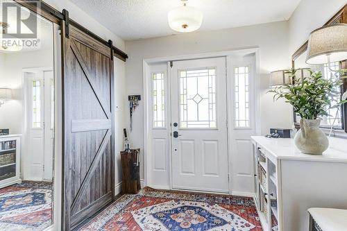 Ample Foyer with Barn door - 1279 Old English Lane, Oakville, ON - Indoor Photo Showing Other Room