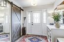 Ample Foyer with Barn door - 1279 Old English Lane, Oakville, ON  - Indoor Photo Showing Other Room 