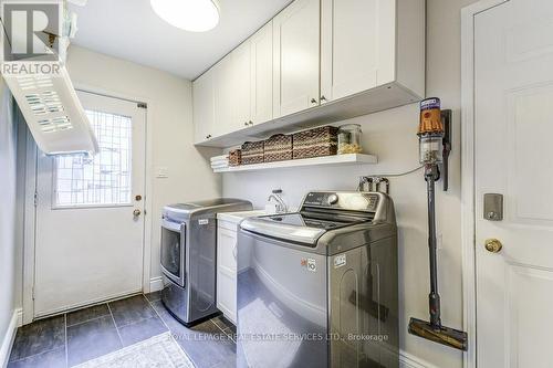 Main floor laundry - 1279 Old English Lane, Oakville, ON - Indoor Photo Showing Laundry Room