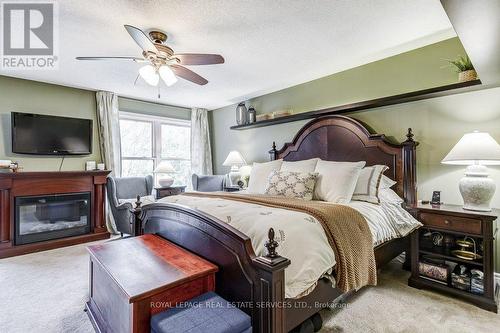 Primary Bedroom - 1279 Old English Lane, Oakville, ON - Indoor Photo Showing Bedroom With Fireplace