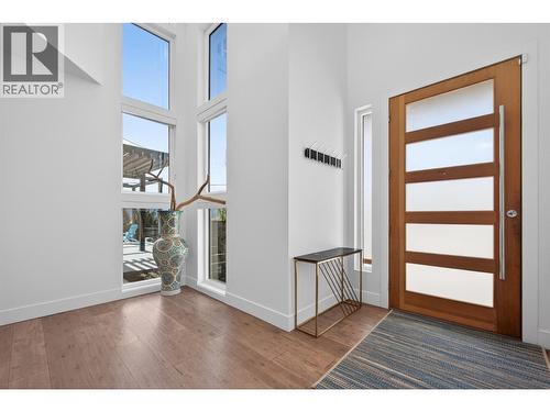 Bright front entry filled with natural light, highlighted by soaring ceilings. - 3859 Carrall Road, West Kelowna, BC 