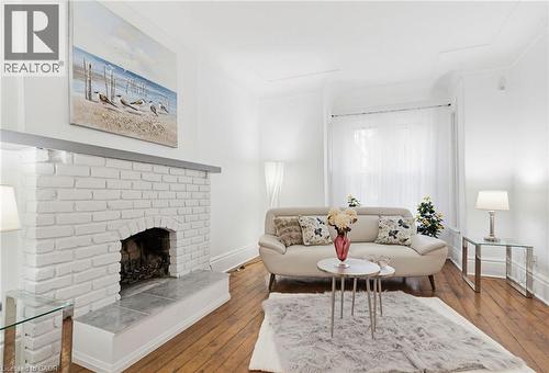 42 Erie Avenue, Hamilton, ON - Indoor Photo Showing Living Room With Fireplace