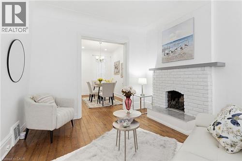 42 Erie Avenue, Hamilton, ON - Indoor Photo Showing Living Room With Fireplace