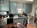 316 4Th Avenue W, Watrous, SK  - Indoor Photo Showing Kitchen With Double Sink 