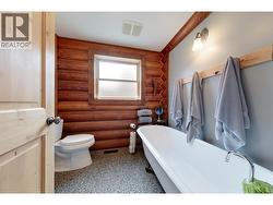 Main floor bathroom with soaker tub - 