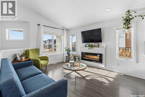 403 Delainey Road, Saskatoon, SK - Indoor Photo Showing Living Room With Fireplace