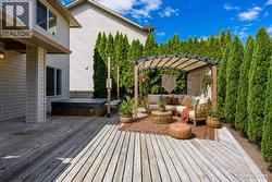 VIRTUALLY STAGED - Added cedar trees to envision extra privacy - 
