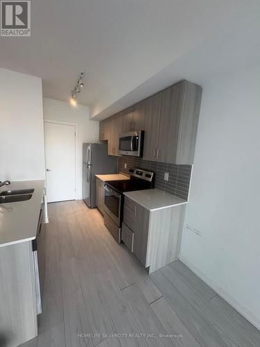 312 - 550 North Service Road, Grimsby, ON - Indoor Photo Showing Kitchen With Stainless Steel Kitchen With Double Sink