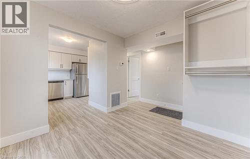 Open-concept living area with light wood-finish flooring - 40 Daniel Avenue Unit# 2, Kitchener, ON - Indoor