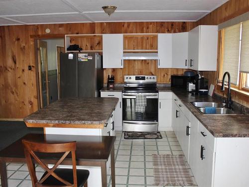 51 Grant Dr, Rainy River, ON - Indoor Photo Showing Kitchen With Double Sink