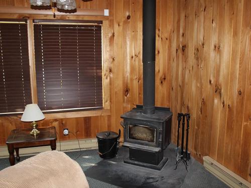51 Grant Dr, Rainy River, ON - Indoor With Fireplace