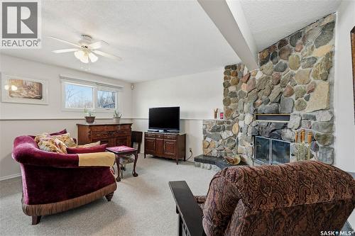 110 Mccarthy Boulevard N, Regina, SK - Indoor Photo Showing Living Room With Fireplace