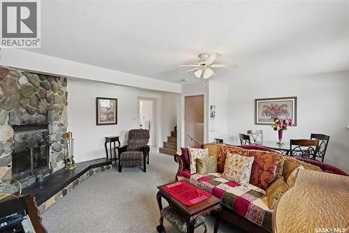 110 Mccarthy Boulevard N, Regina, SK - Indoor Photo Showing Living Room With Fireplace