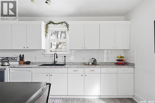 236 I Avenue N, Saskatoon, SK - Indoor Photo Showing Kitchen With Double Sink