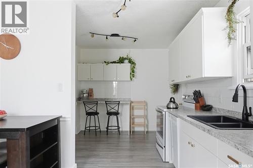 236 I Avenue N, Saskatoon, SK - Indoor Photo Showing Kitchen With Double Sink
