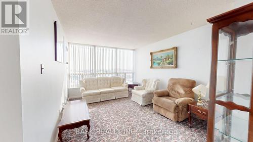 907 - 12 Laurelcrest Street, Brampton, ON - Indoor Photo Showing Living Room