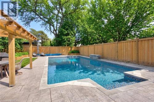 AI enhanced - 17 Braemar Place, Hamilton, ON - Outdoor With In Ground Pool With Backyard