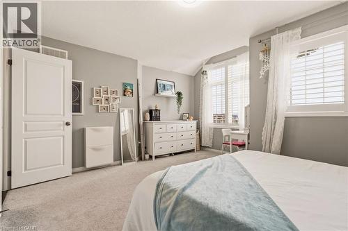 Spacious room featuring light gray walls and plush carpet flooring - 42 Yager Drive, Binbrook, ON - Indoor Photo Showing Bedroom