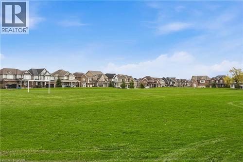 Expansive green space featuring lush lawn and multiple soccer goals - 42 Yager Drive, Binbrook, ON - Outdoor