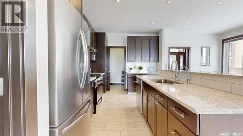 2098 Riverbend View, Regina, SK - Indoor Photo Showing Kitchen With Double Sink