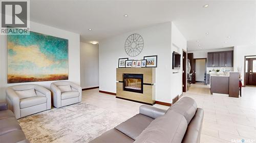 2098 Riverbend View, Regina, SK - Indoor Photo Showing Living Room With Fireplace