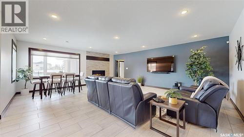 2098 Riverbend View, Regina, SK - Indoor Photo Showing Living Room With Fireplace