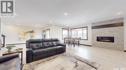 2098 Riverbend View, Regina, SK - Indoor Photo Showing Living Room With Fireplace