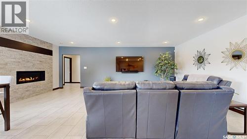 2098 Riverbend View, Regina, SK - Indoor With Fireplace