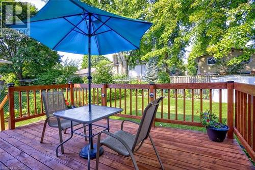 Overlooks the peaceful backyard. - 12 Miller Crescent, Simcoe, ON - Outdoor With Deck Patio Veranda With Exterior