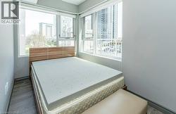 Corner window placement featuring a cityscape and green space - 