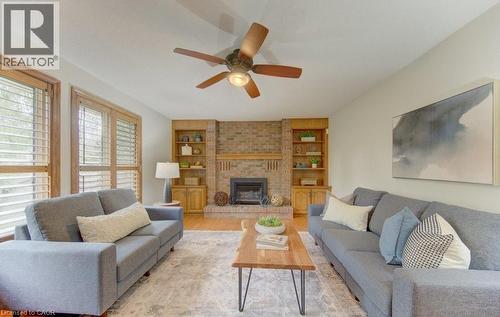 333 Calvington Place, Waterloo, ON - Indoor Photo Showing Living Room With Fireplace