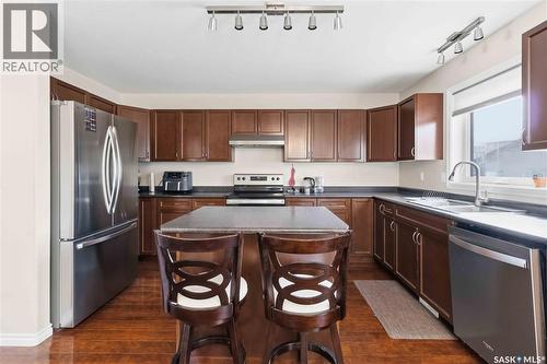 610 Stonebridge Common, Saskatoon, SK - Indoor Photo Showing Kitchen With Double Sink