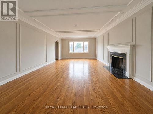 digitally altered to remove tenants' belongings - 84 Riverdale Avenue, Ottawa, ON - Indoor With Fireplace