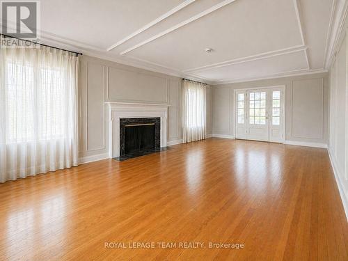 digitally altered to remove tenants' belongings - 84 Riverdale Avenue, Ottawa, ON - Indoor Photo Showing Living Room With Fireplace