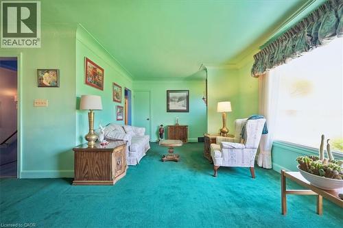 Living area featuring wall-to-wall carpeting and painted walls - 2117 Edinburgh Drive, Burlington, ON - Indoor