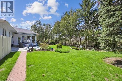 Expansive green lawn with mature trees and established landscaping - 2117 Edinburgh Drive, Burlington, ON - Outdoor