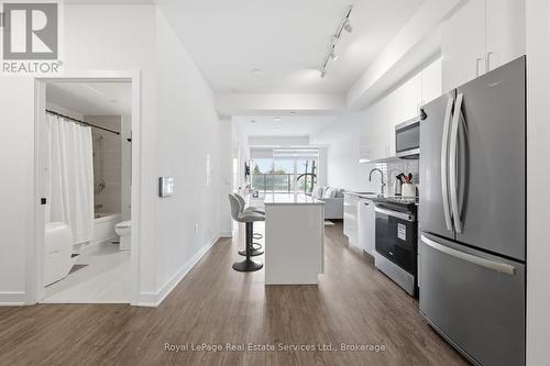 202 - 2782 Barton Street E, Hamilton (Riverdale), ON - Indoor Photo Showing Kitchen With Stainless Steel Kitchen