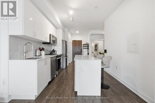 202 - 2782 Barton Street E, Hamilton (Riverdale), ON - Indoor Photo Showing Kitchen With Upgraded Kitchen