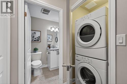 801 - 330 Ridout Street N, London East (East K), ON - Indoor Photo Showing Laundry Room