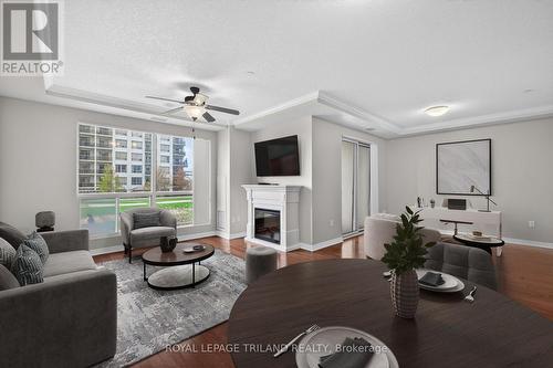 801 - 330 Ridout Street N, London East (East K), ON - Indoor Photo Showing Living Room With Fireplace