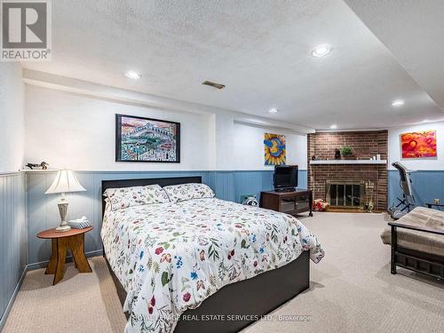 77 Martindale Crescent, Brampton, ON - Indoor Photo Showing Bedroom With Fireplace
