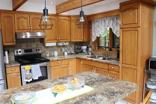 432 Bayles Road, Nakusp, BC - Indoor Photo Showing Kitchen With Stainless Steel Kitchen With Double Sink