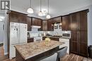 44 100 Brooklyn Lane, Warman, SK  - Indoor Photo Showing Kitchen 